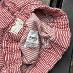 Pre-loved Aosta red hickory stripe pull-on pants, kids size 2T, brand and size label close-up
