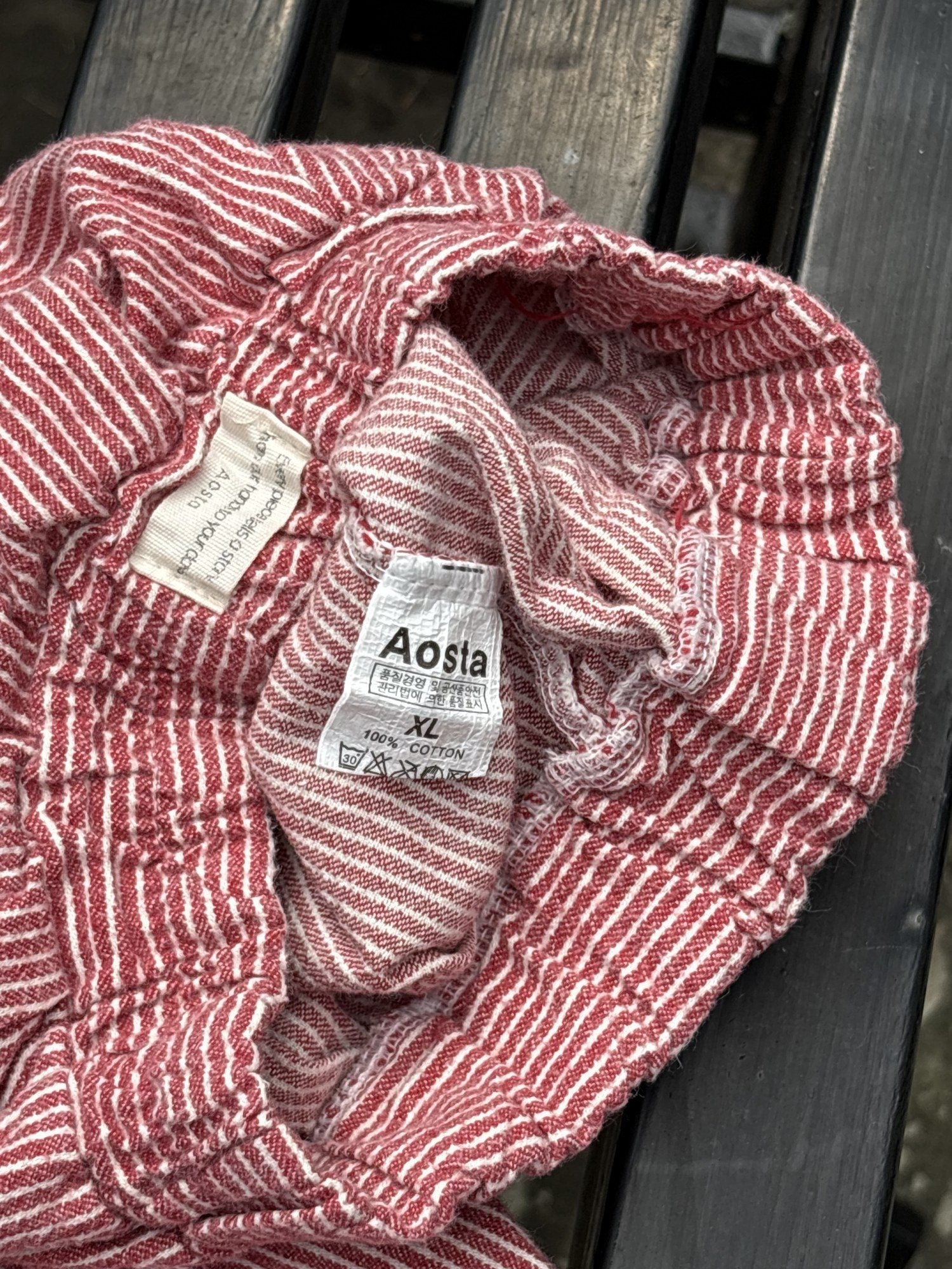 Pre-loved Aosta red hickory stripe pull-on pants, kids size 2T, brand and size label close-up