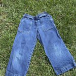 Pre-loved J.Crew wide-leg pull-on jeans, kids size 8, front view, laid flat on grass