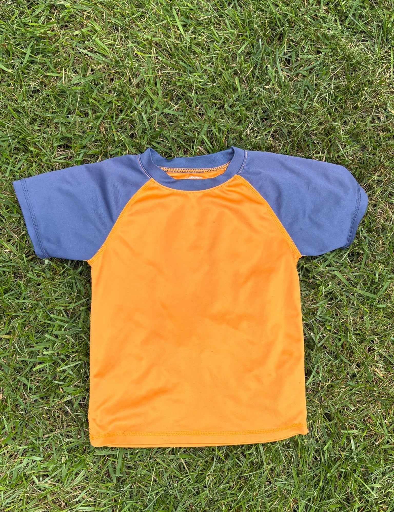 Kanu Orange and Navy Colorblock Rashguard, Size 5T, pre-loved, front view