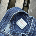 Pre-loved Old Navy denim workwear bib overalls, kids size 3-6M, brand and size label close-up