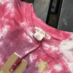 Pre-loved Red Egg & Ginger pink tie-dye gold star romper, kids size 3-6M, brand and size label close-up